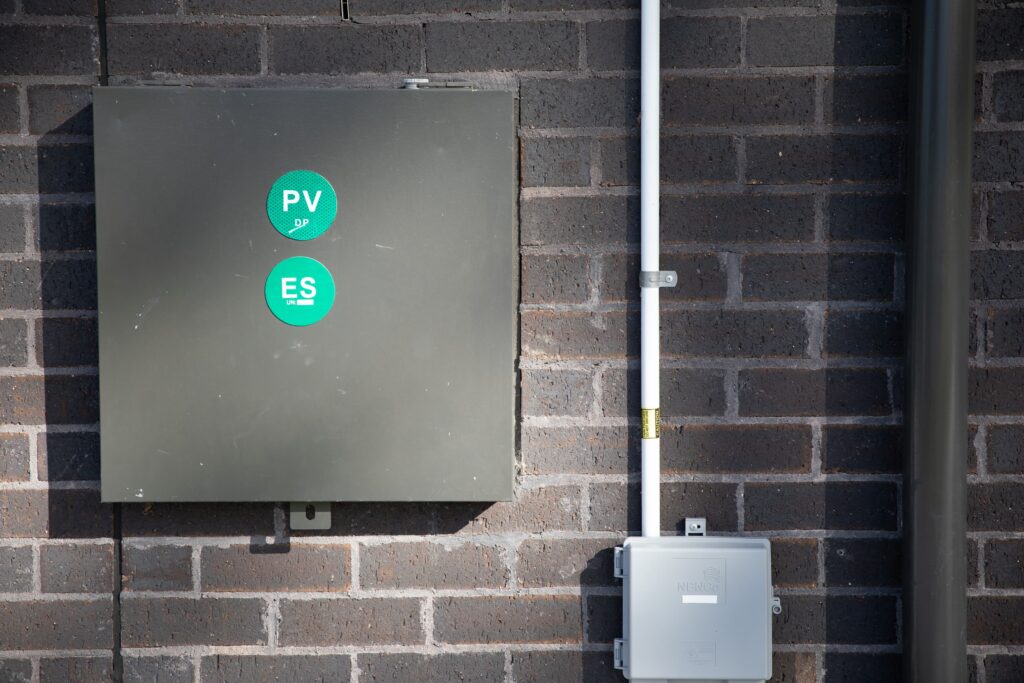 PV and battery isolators mounted on an exterior wall, the Northern Rivers & Tweed