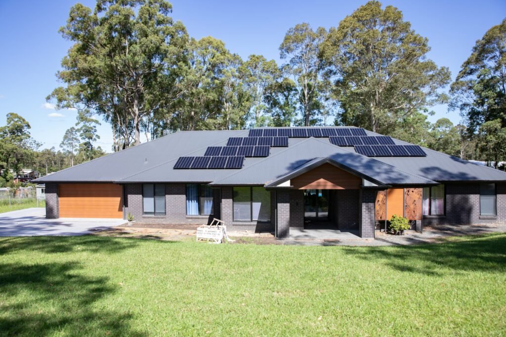 A completed rooftop array seen from the front lawn, Wollongong & the Illawarra