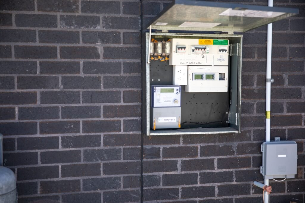 A meter box and inverter mounted on an exterior wall, the Hunter Valley